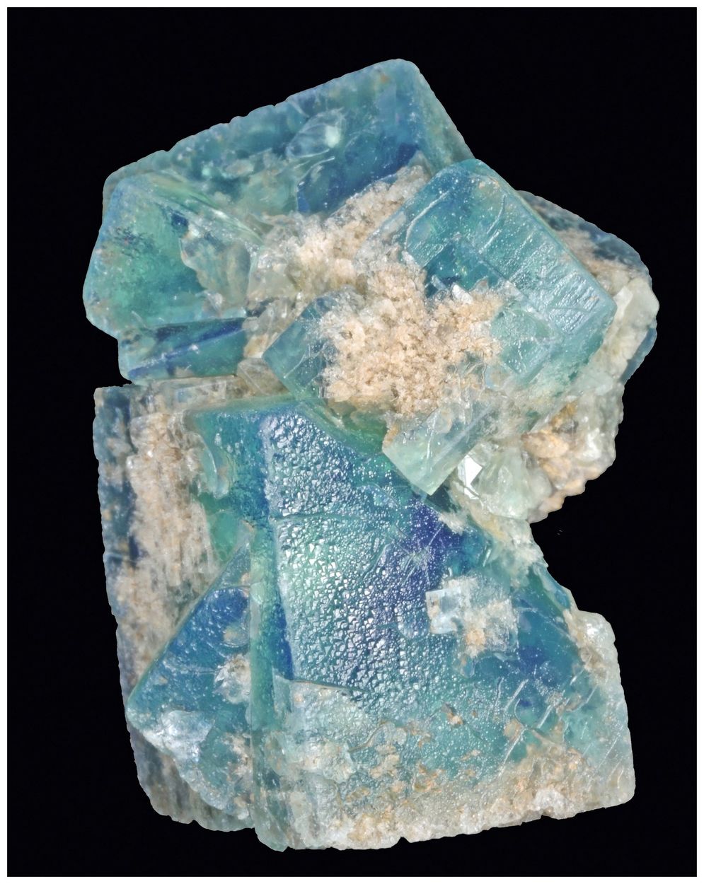 Cubic fluorite showing the geometry, zoning, and glassy luster that make the species collectible.