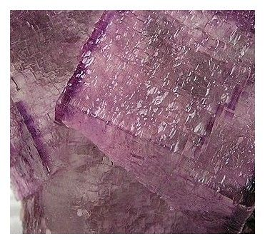 Elmwood detail: sharp purple faces and dark sphalerite association.